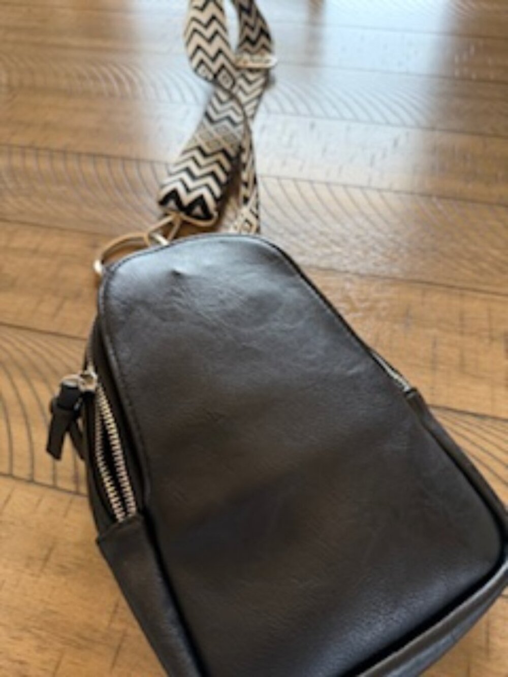 Coco & Carmen black sling handbag